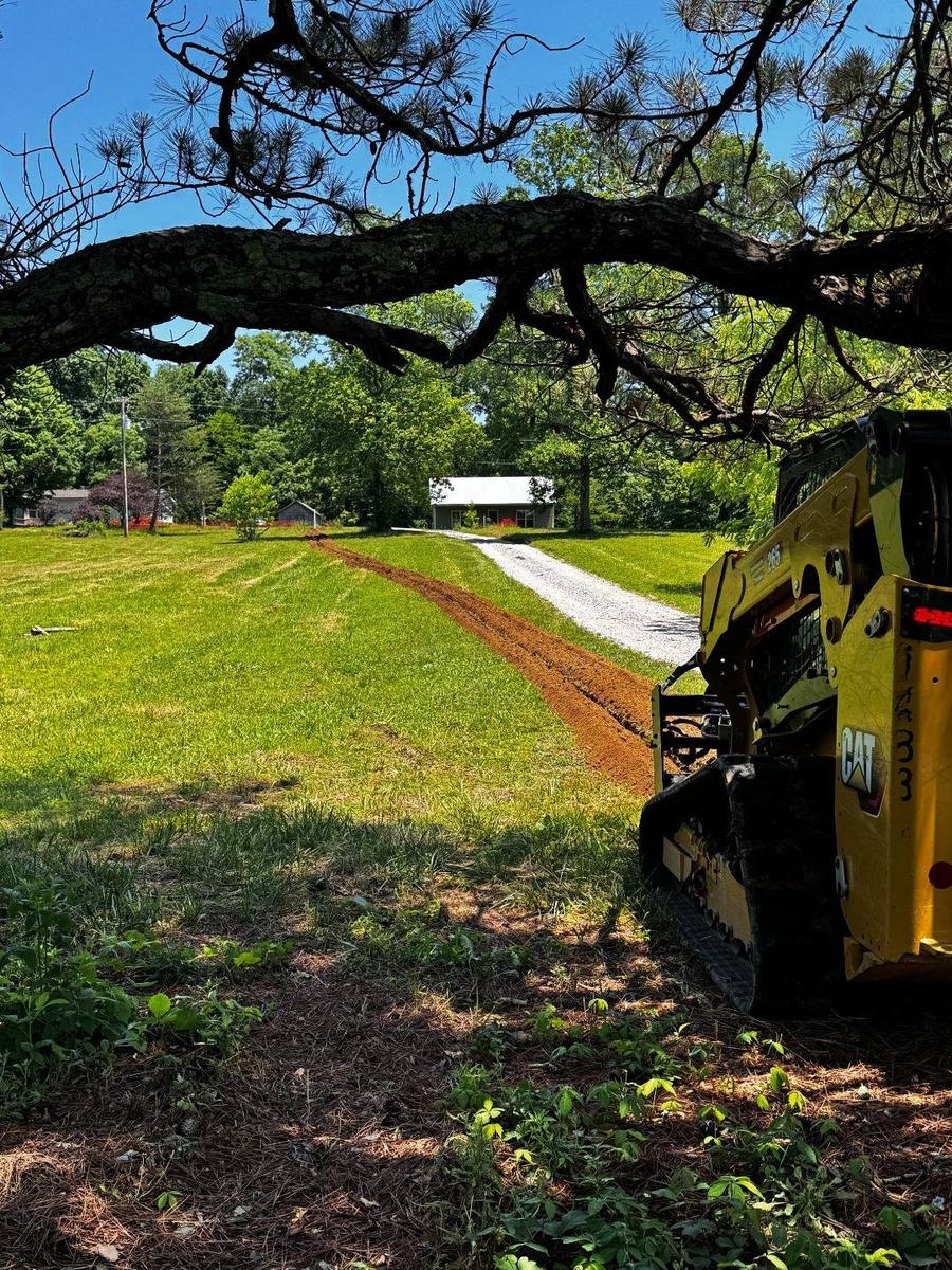Waterline trenching and PEX install for a new home build in Columbia, TN using our Cat 265 Compact Track Loader with Trenching attachment.