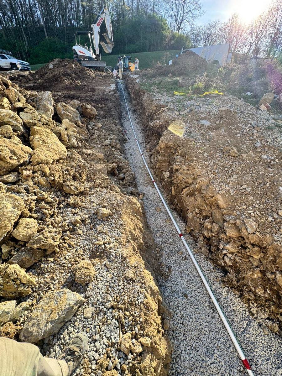 Sewer line trenching and pipe installation for a new home build in Franklin, TN